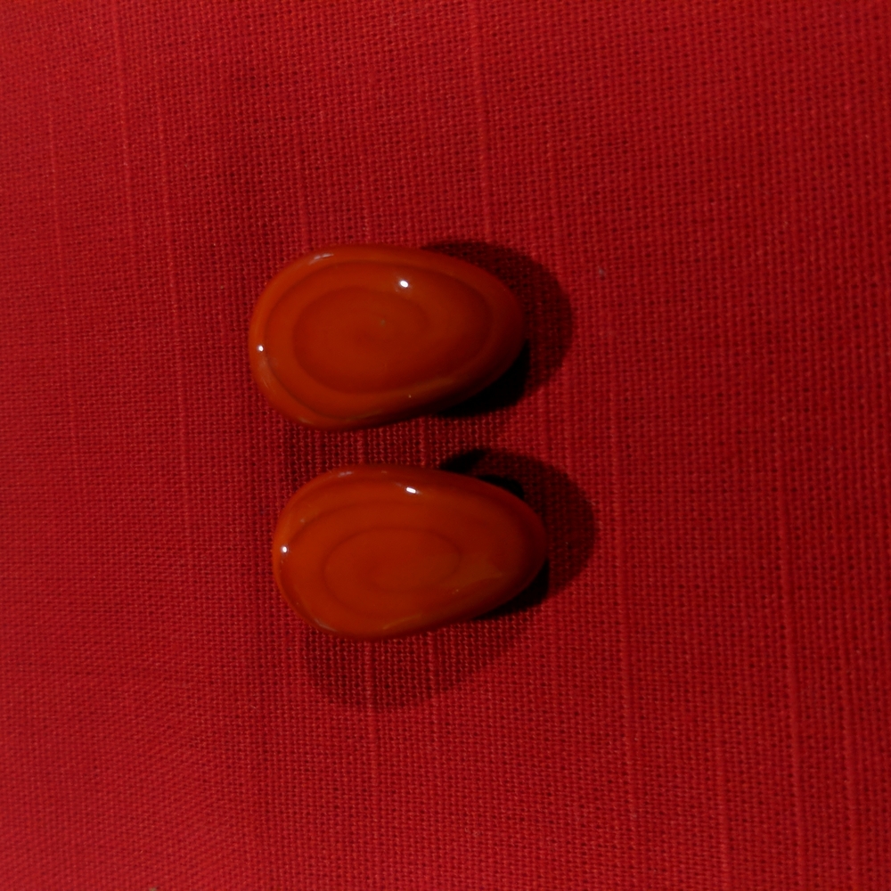 Red with swirl stone Japan earrings
